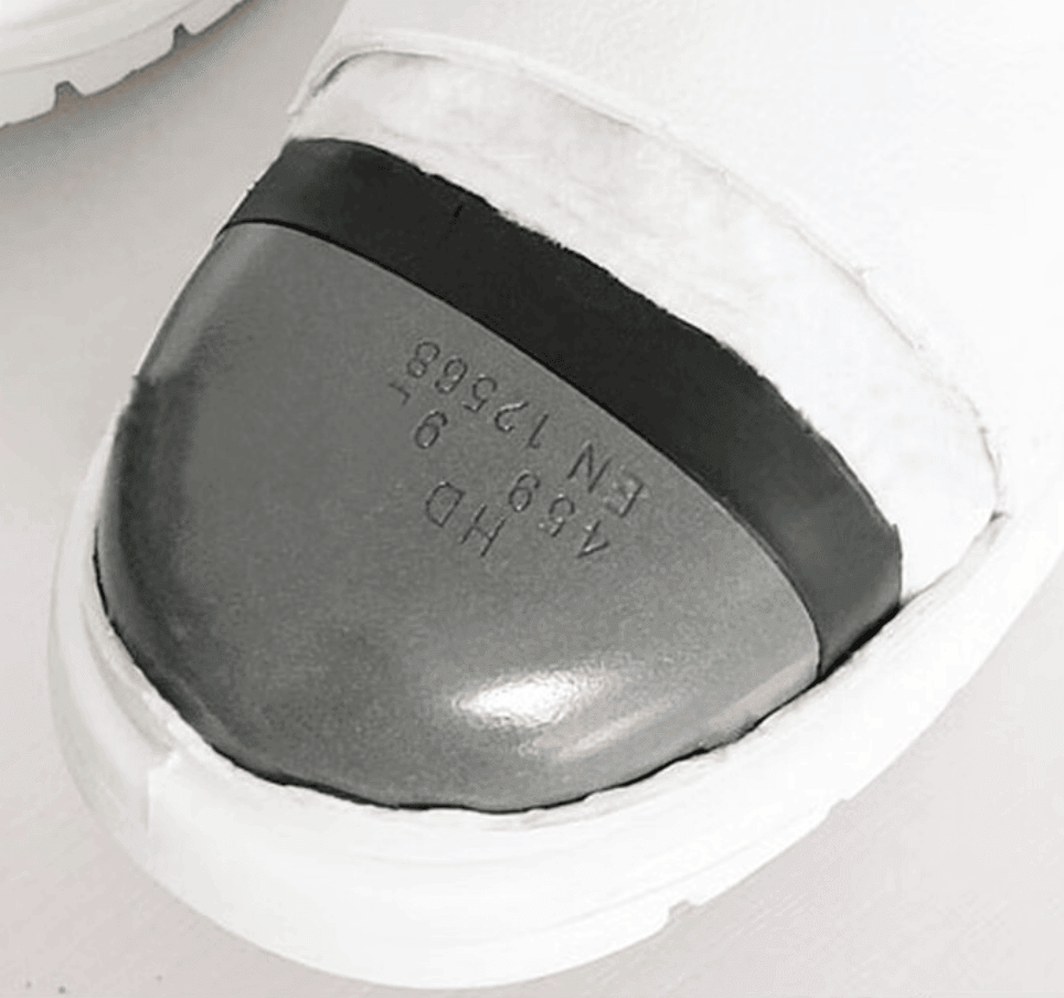ESD shoe construction showing upper, conductive insole, midsole and outsole
