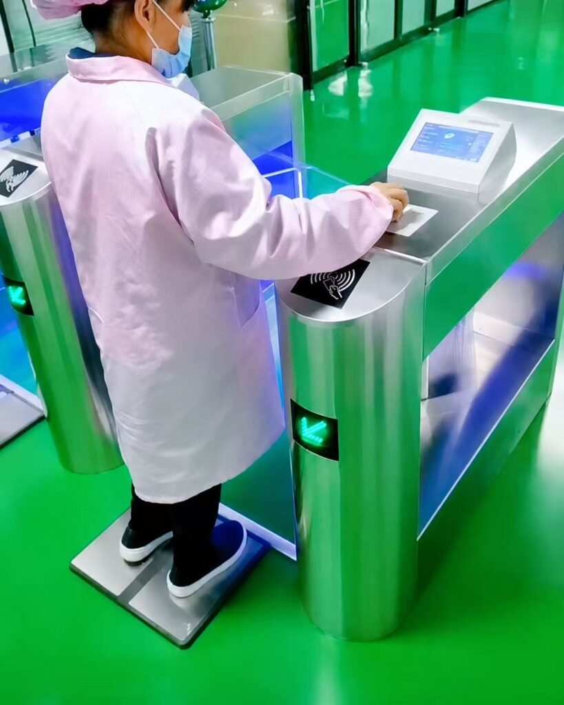 Operator testing ESD shoes with a personnel grounding tester before entering an EPA