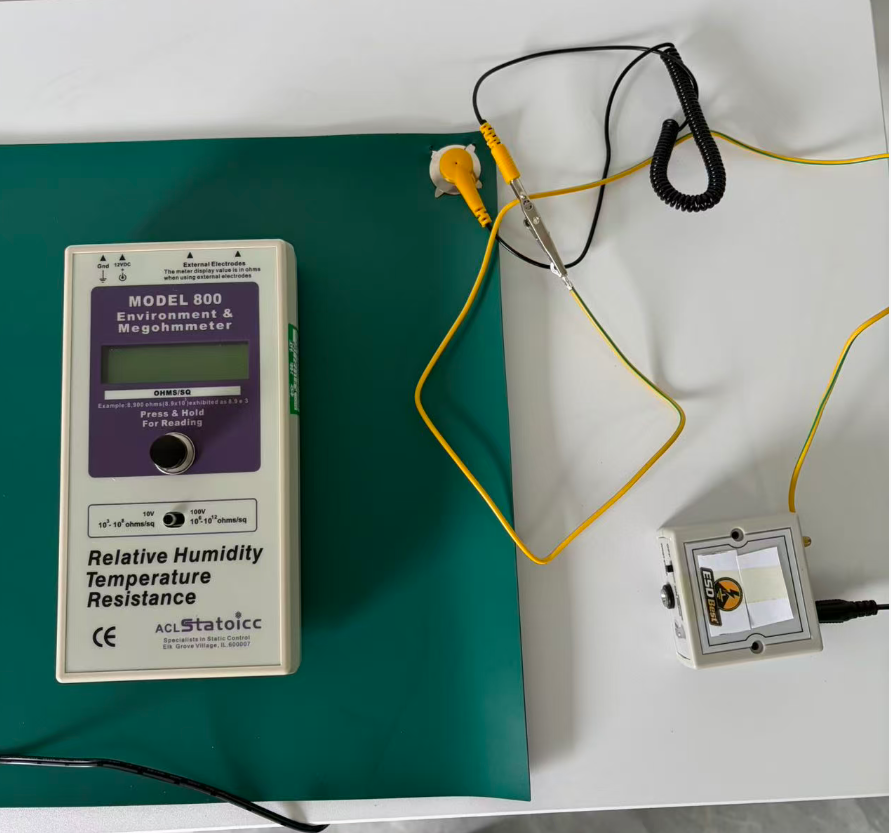 ACL 800 resistance meter testing an ESD workbench surface to ground