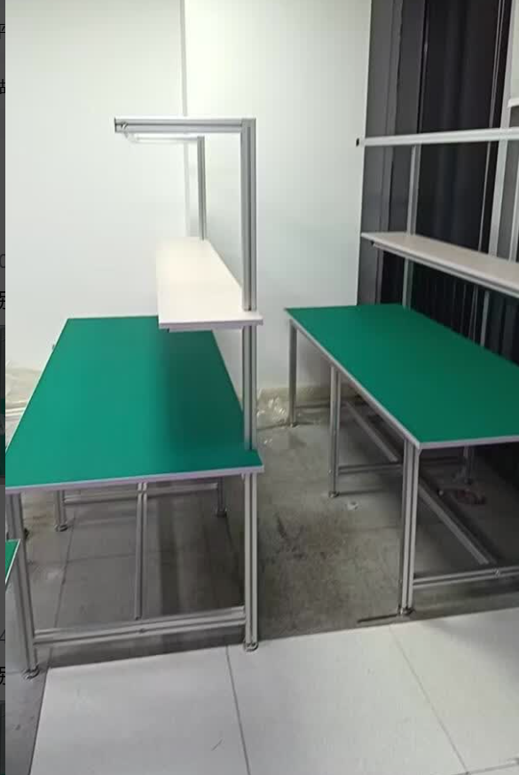 Electronics repair ESD workbench with soldering equipment, microscope and ionizer