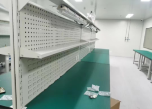 Semiconductor production line using grounded ESD mats for static control.